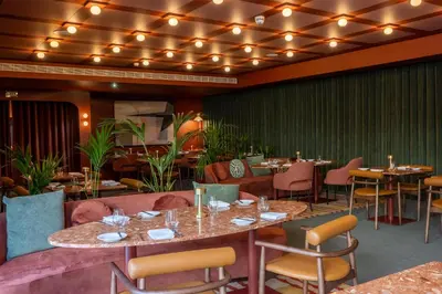 a table full of breakfast food on a table at Cenica Porto Hotel, Curio Collection By Hilton in Porto