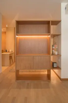 a room with a wall with wooden shelves at Dixo's Oporto Apartments Duplex in Porto
