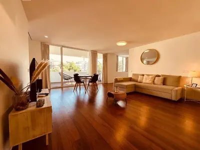 a living room with a couch and a table at Bombarda H in Porto