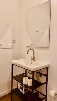 a kitchen with a sink and a stove at Raul Dória - Guesthouse in Porto