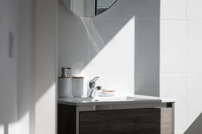 a bathroom with a sink and a mirror at Aparts d'Avó in Porto