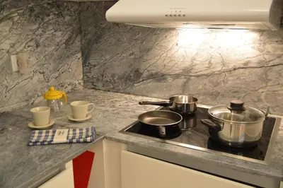 a kitchen with two pots and pans on a stove at Oporto Almada 329 in Porto
