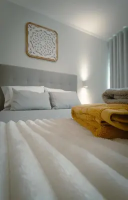 a bedroom with two beds with white sheets at The Cale - Antero de Quental - 12 in Porto