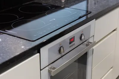 a blue stove top oven in a kitchen at Trindade Premium Suites & Apartments in Porto