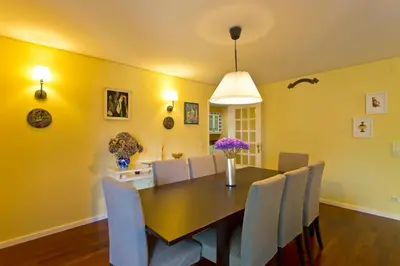 a dining room with a table and chairs at VIVA Belos Ares in Porto