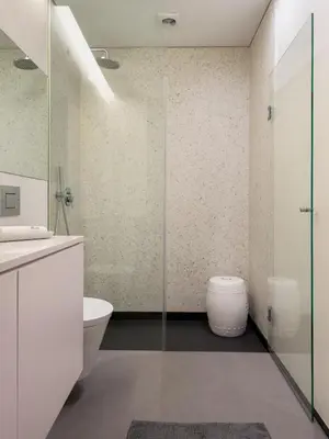 a bathroom with a toilet and a glass shower at Domum in Porto