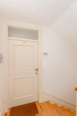 a room with a white door with an alcove at Liiiving in Porto - Trindade Deluxe Studios in Porto