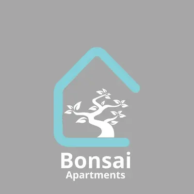 a house with a tree logo at Bonsai Apartment 6 in Porto