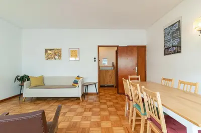 a bedroom with a bed and a potted plant at Bonfim Sunny Vintage apartment in Porto