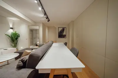 a living room with a couch and a table at 24 Agosto Amazing Triplex by Vacationy in Porto