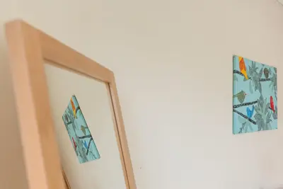 a doorway with two pictures on the wall at GuestReady - Even Flow Flat in Porto