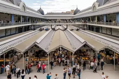 an overhead view of a shopping mall with people walking around it at Poveiros Studio OPorto City Center in Porto