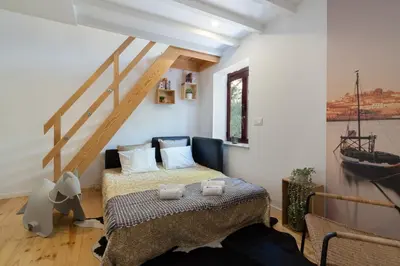a bedroom with a bed in a room at Host Wise - Sunny Bright Duplexes & Pool in Vila Nova de Gaia