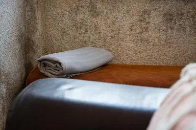 a pillow sitting on top of a wooden table at GuestReady - Mezzanine comfort in Porto in Porto