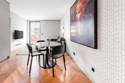 a dining room with a table and chairs at Sao Lazaro Premium Apartments in Porto