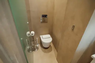 a small bathroom with a toilet in a stall at Downtown Elegant by Hosty in Porto