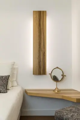 a room with a wooden shelf next to a bed at By the River 1 by Porto Dream Stays in Porto