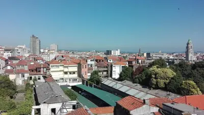a view of a city with houses and buildings at Seagull Rooftop Downtown - Light and Views in Porto