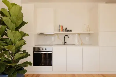a living room with a couch and a table at Oasiys - Your Getaway in Porto in Porto