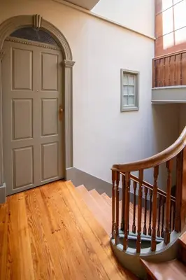 an empty room with a door and a staircase at Once Upon in Porto Apartment III in Porto