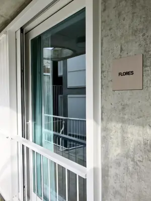 a door with a sign that says huts on it at Oporto Serviced Apartments - Miragaia II in Porto