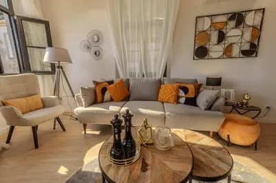 a living room with a couch and a table at River Sight Corticeira III in Porto
