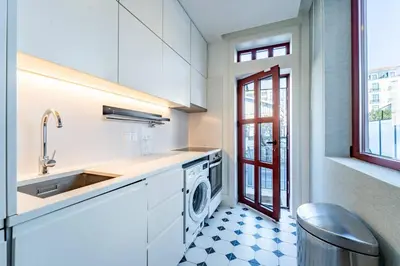 a bed with a white pillow and a night stand at Intimate Apartment Downtown With Terrace - D in Porto
