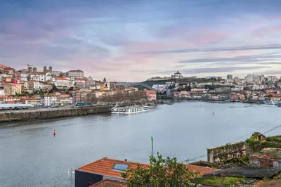 a view of a river with a city at HostWise - Artistic Escape with Modern Comfort in Vila Nova de Gaia