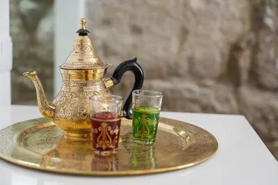 a tray with a tea pot and two glasses on it at GuestReady - Boutique style loft in Constitution in Porto