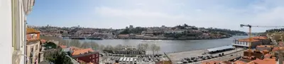 a view of a river with buildings and a city at GuestReady - Hope Apartments in Porto