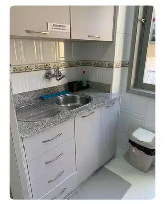 a small kitchen with a sink and a toilet at Best Stay in Porto in Porto