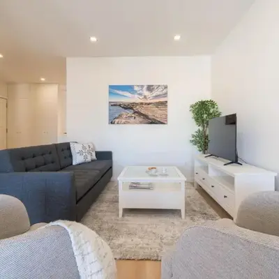 Bright & Spacious Retreat with Balcony by HostWise