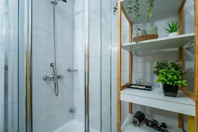 a bathroom with a shower and a sink at Oporto Center at Your Doorstep 1 in Porto