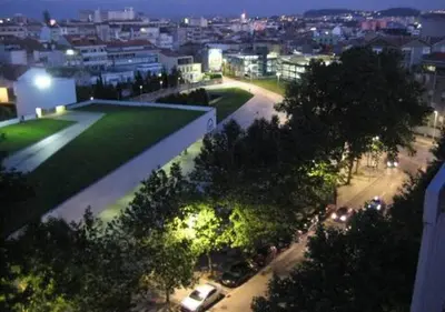 an aerial view of a city at night at Trindade 99 - Porto Downtown Apartment in Porto