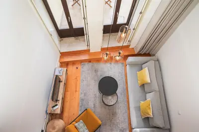 an overhead view of the living room of a house at Classy Garden in Porto