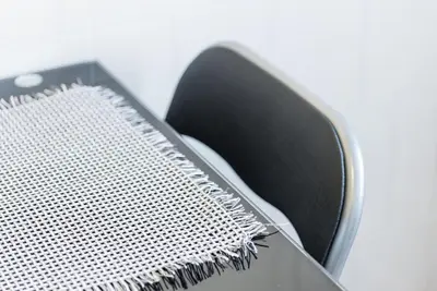 a black and white comb sitting on top of a chair at GuestReady - Porto Panoramic View in Vila Nova de Gaia