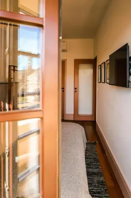 a small room with a bed and a window at Casa Priorado - Charming View City Center in Porto