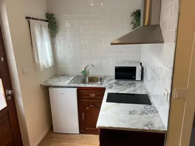 a kitchen with a sink and a counter top at River Pace III in Porto