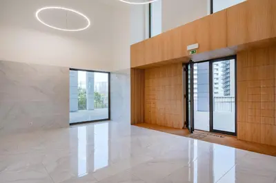 a glass door leading to a bedroom with a bed at Antas Green Executive in Porto
