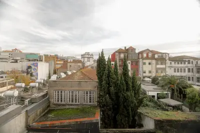 a view of a city with buildings and trees at Cedofeita Downtown Nightlife by PCH in Porto