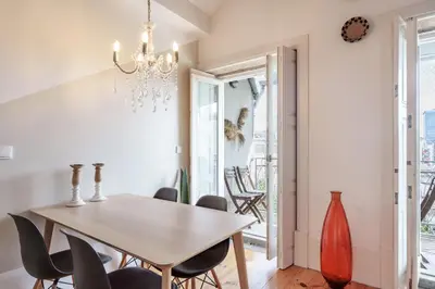 a dining room with a table and chairs at VIVA Boho Chic in Porto