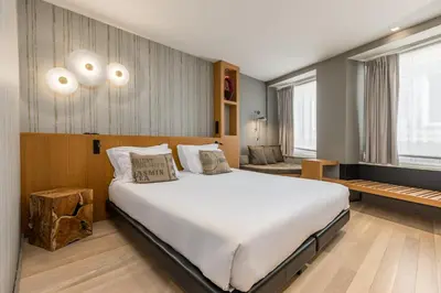 a bedroom with a large bed in a room at Descobertas Boutique Hotel by Aspasios in Porto