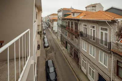 a view of a city street with buildings and cars at Cedofeita Flat by Hosty in Porto