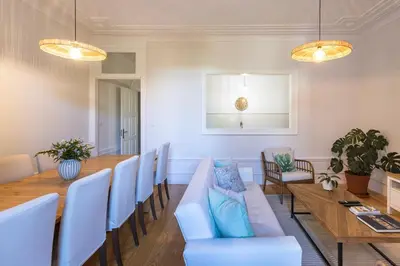 a conference room with a long table and chairs at Alegria Rubi - Urban Oasis with Garden in Porto