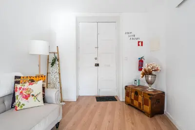 a living room with a couch and a table at GuestReady - Oporto Old Town House 2 in Porto
