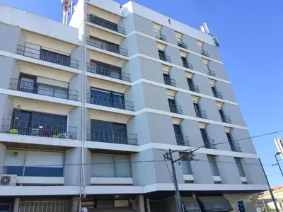 a white building with balconies on a street at LV Premier Apartments Clerigos-RE2 in Porto