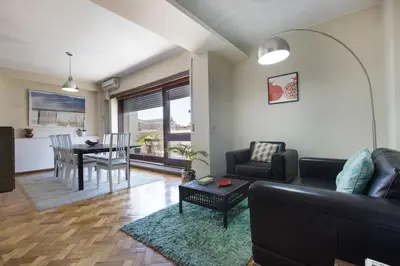 a living room with a couch and a table at LV Premier Apartments Clerigos-RE2 in Porto