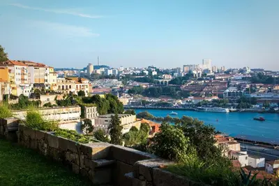 a view of a city with a river and buildings at A House With A View - 1st floor in Porto