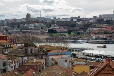 a view of a city with a river and buildings at Miragaia Studio w Patio by LovelyStay in Porto
