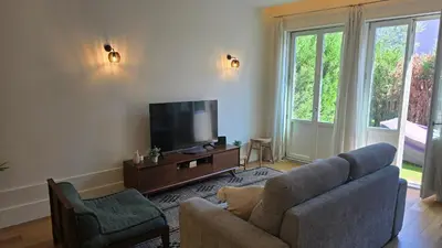 a pair of french doors on a house with a porch at Pink Lux Apartments in Porto